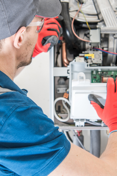 technician working on furnace